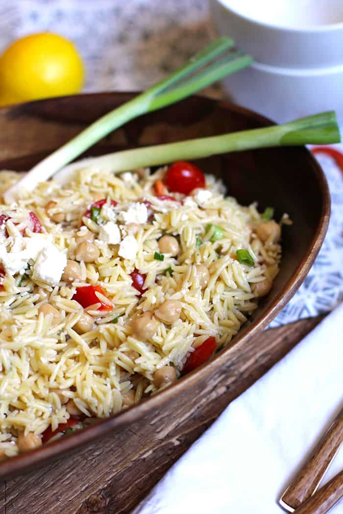 Lemon Orzo Pasta Salad is a perfect warm weather salad. Super delicious and light tasting - with a lemon, honey, and olive oil dressing! | suebeehomemaker.com