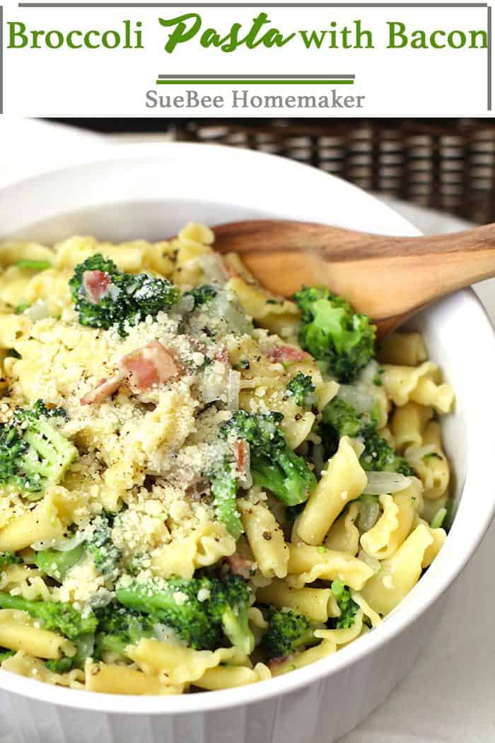 Closeup of a large white bowl of broccoli pasta with bacon.