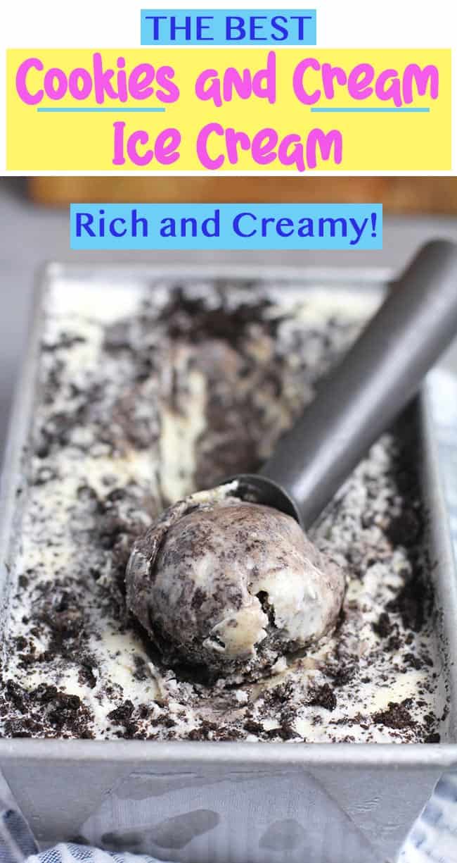 Side shot of a pan of cookies and cream ice cream with an ice cream scoop digging in.