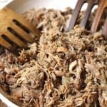 Slow Baked Pulled Pork is the perfect main course for holiday entertaining or as a game day staple. Only 15 minutes of prep and then 12 hours in the oven! | suebeehomemaker.com