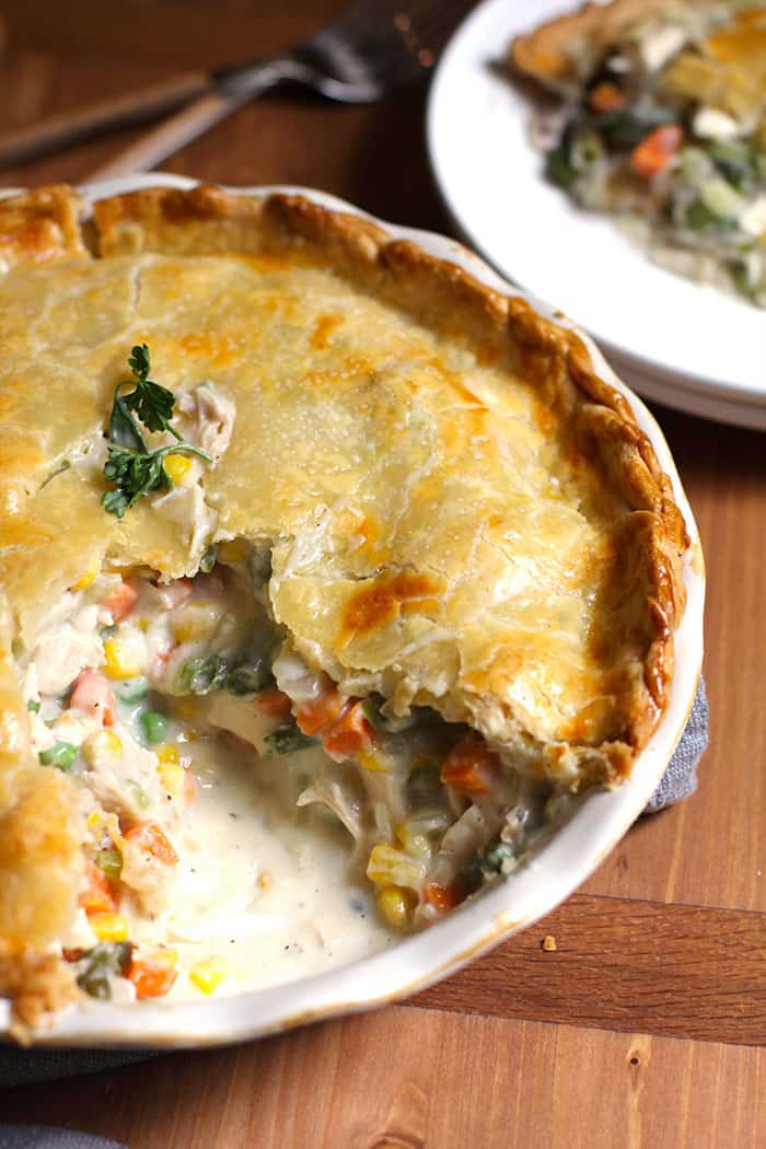 Chicken Dinner Pot pie on a wooden board.