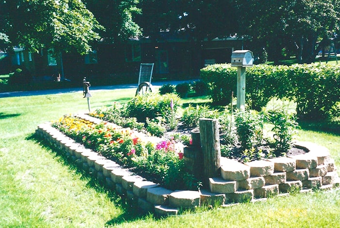 A picture of my mom's beautiful flower garden in Iowa.