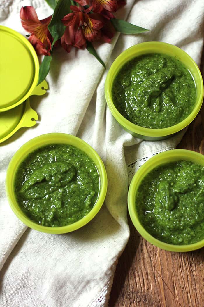 Small bowls of spinach pesto sauce.