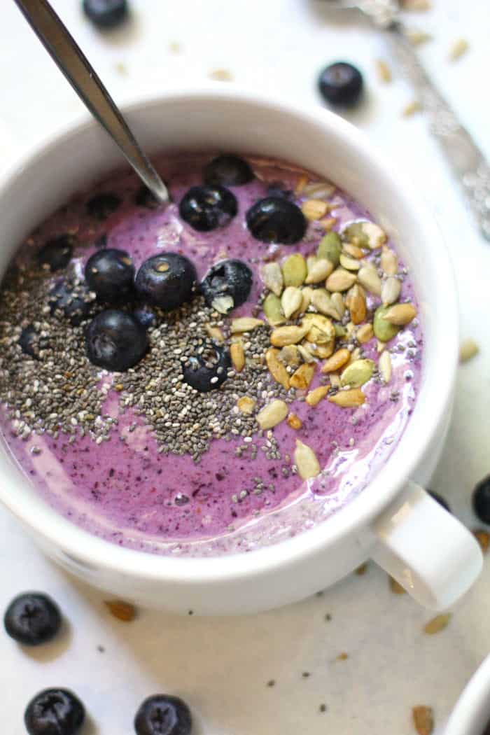 A closeup of a blueberry smoothie bowl.