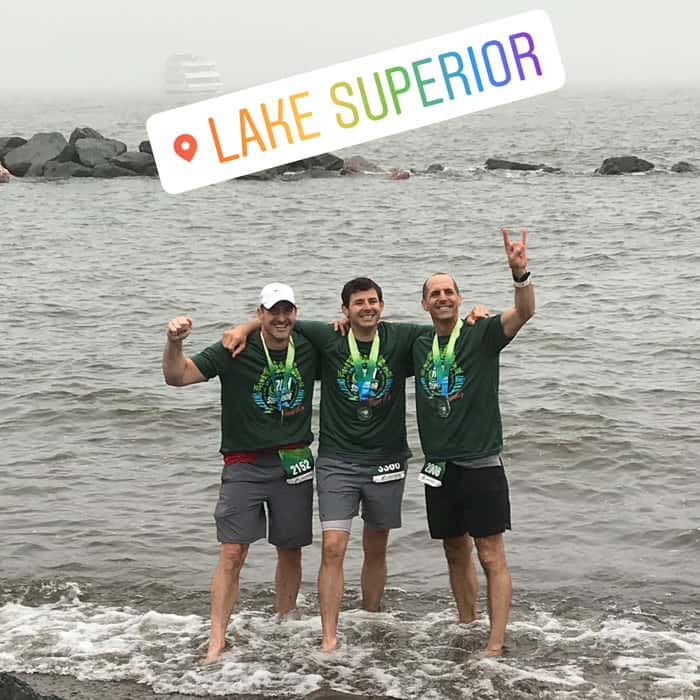 The three brothers celebrated after finishing Grandma's Marathon.