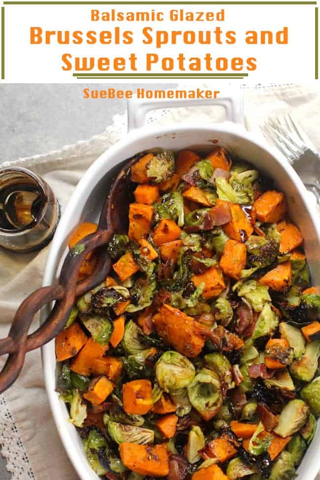 An oblong bowl of Brussels sprouts and sweet potatoes, with a balsamic glaze.