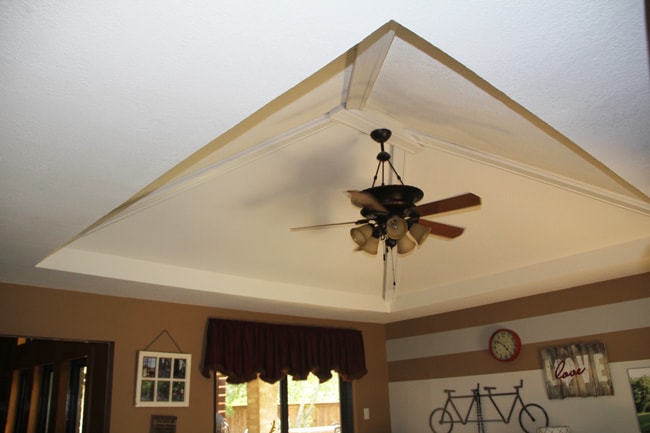 Before picture of ceiling above sunroom.