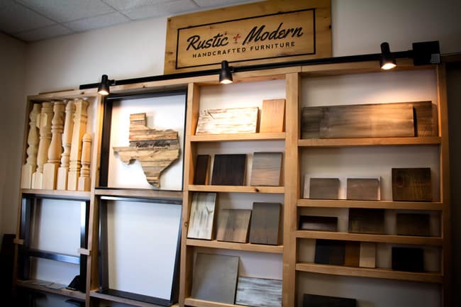 Picture of Rustic and Modern office wall, with wood samples on shelves.