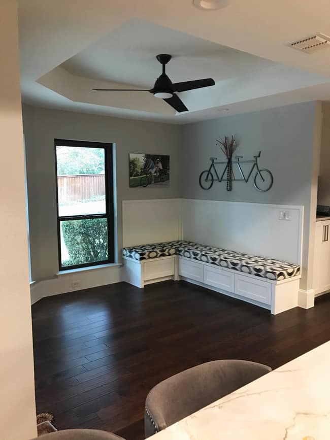 Distant shot of our kitchen nook, showing the booth seating, before the table arrived.