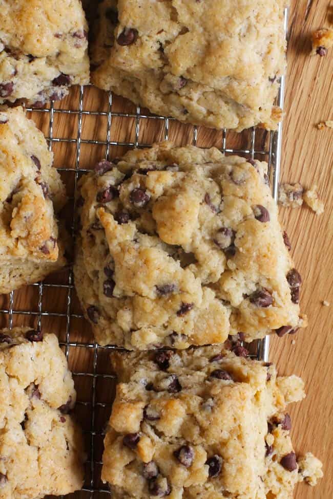 Overhead shot of chocolate chip scones on a wire rack.