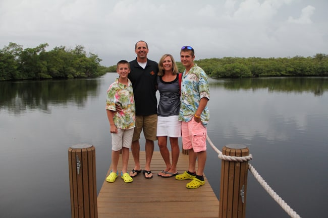 Sue, Mike, Josh, and Zach on a dock in Florida.