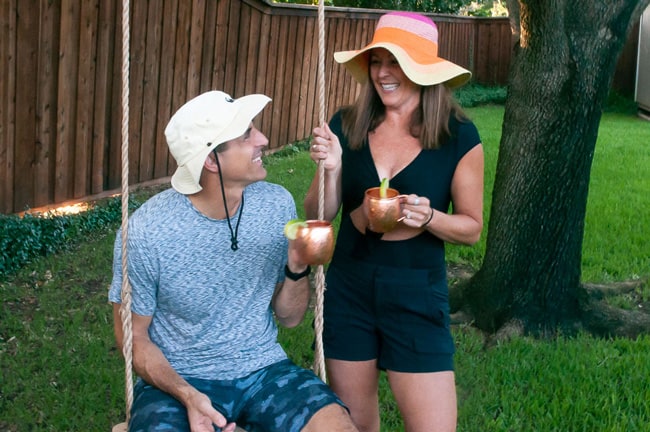 Mike and Sue drinking mules in their backyard.