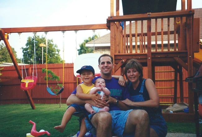 Sue, Mike, and their boys, Josh and Zach, in their backyard in Texas.