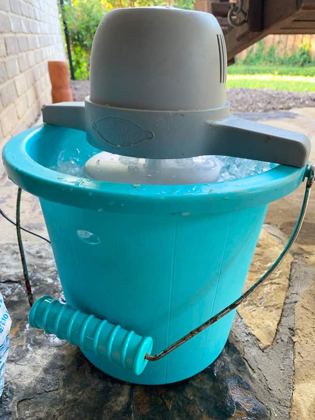 Side shot of a Nostalgia ice cream maker, on an outside patio.