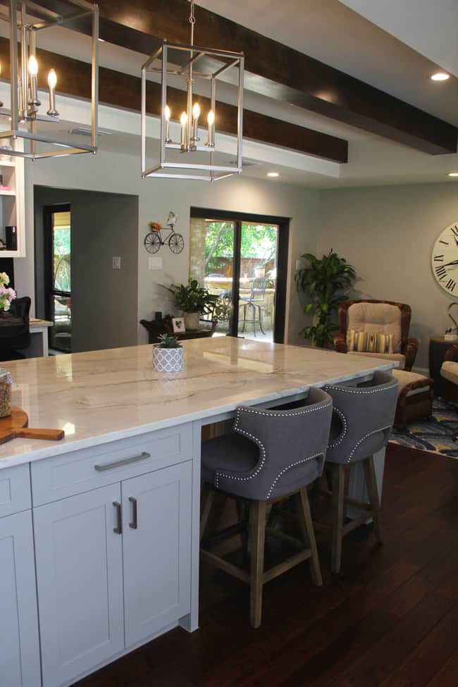 Another angle showing the kitchen island stools.