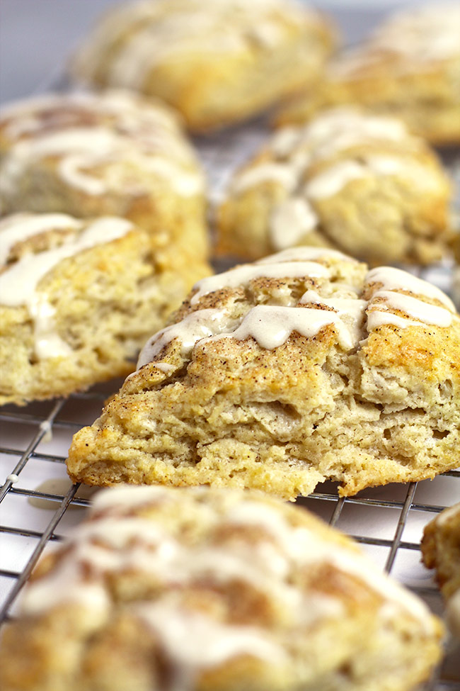 Side shot of the snickerdoodle scones with some cinnamon icing.
