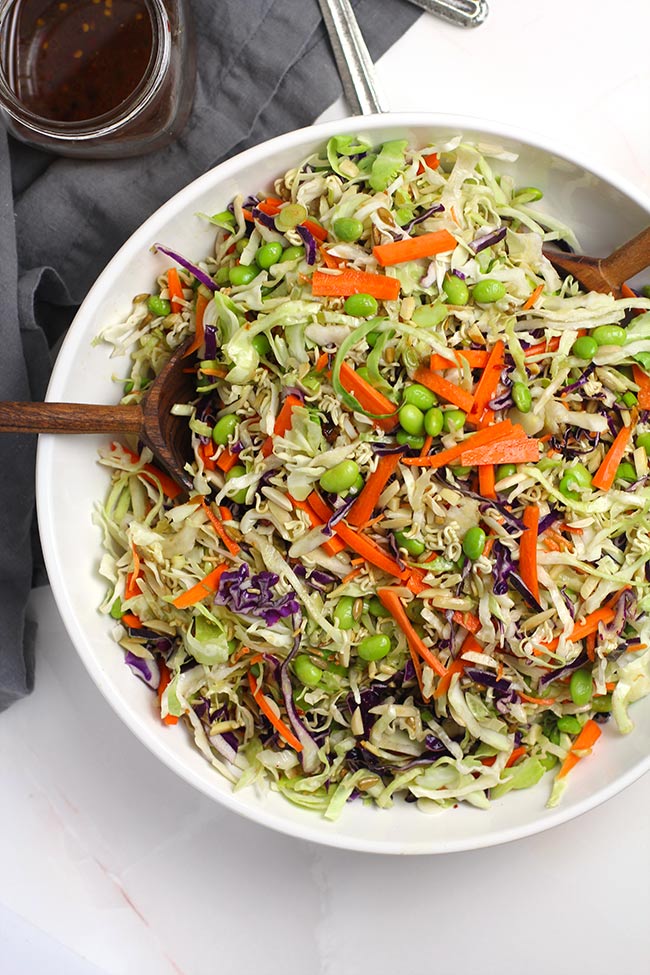 A large white bowl of Asian cabbage salad.