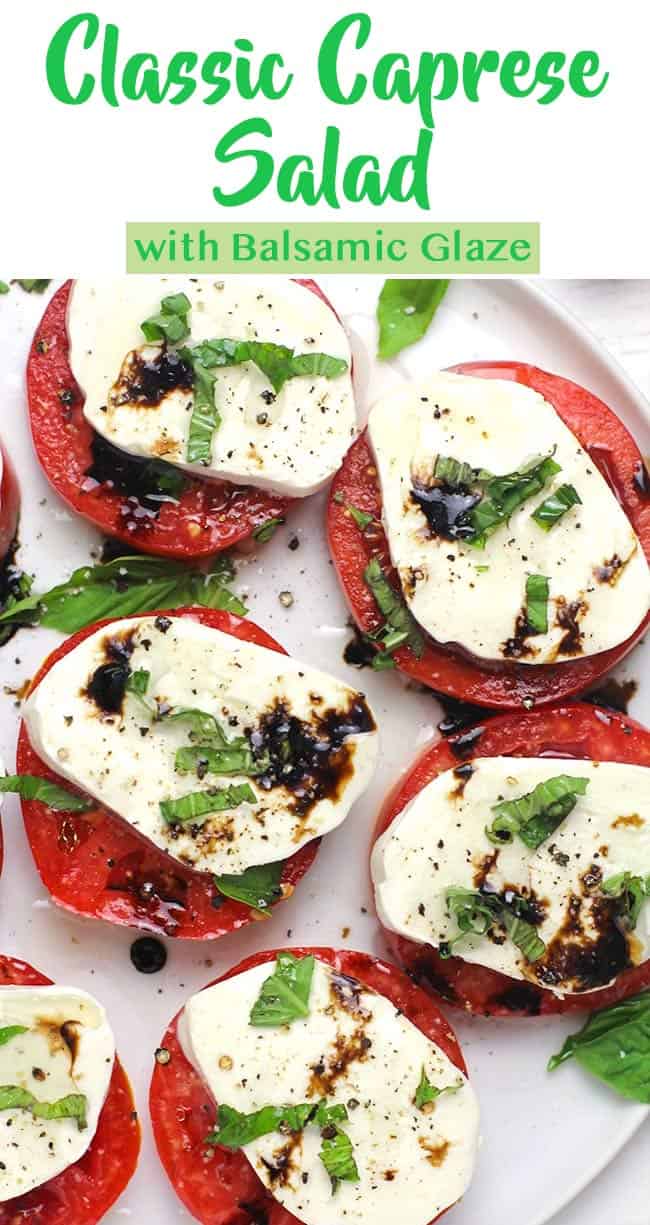 A plate of caprese salad, drizzled with balsamic glaze.