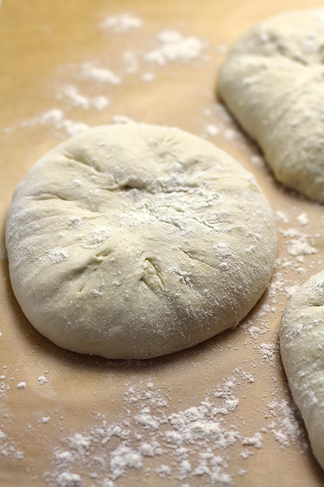 Several rounds of sourdough pizza dough.