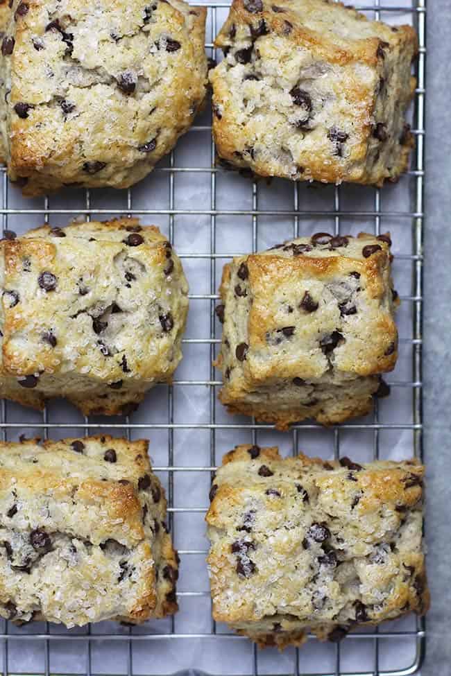 Mini chocolate chip scones on a cooling rack.