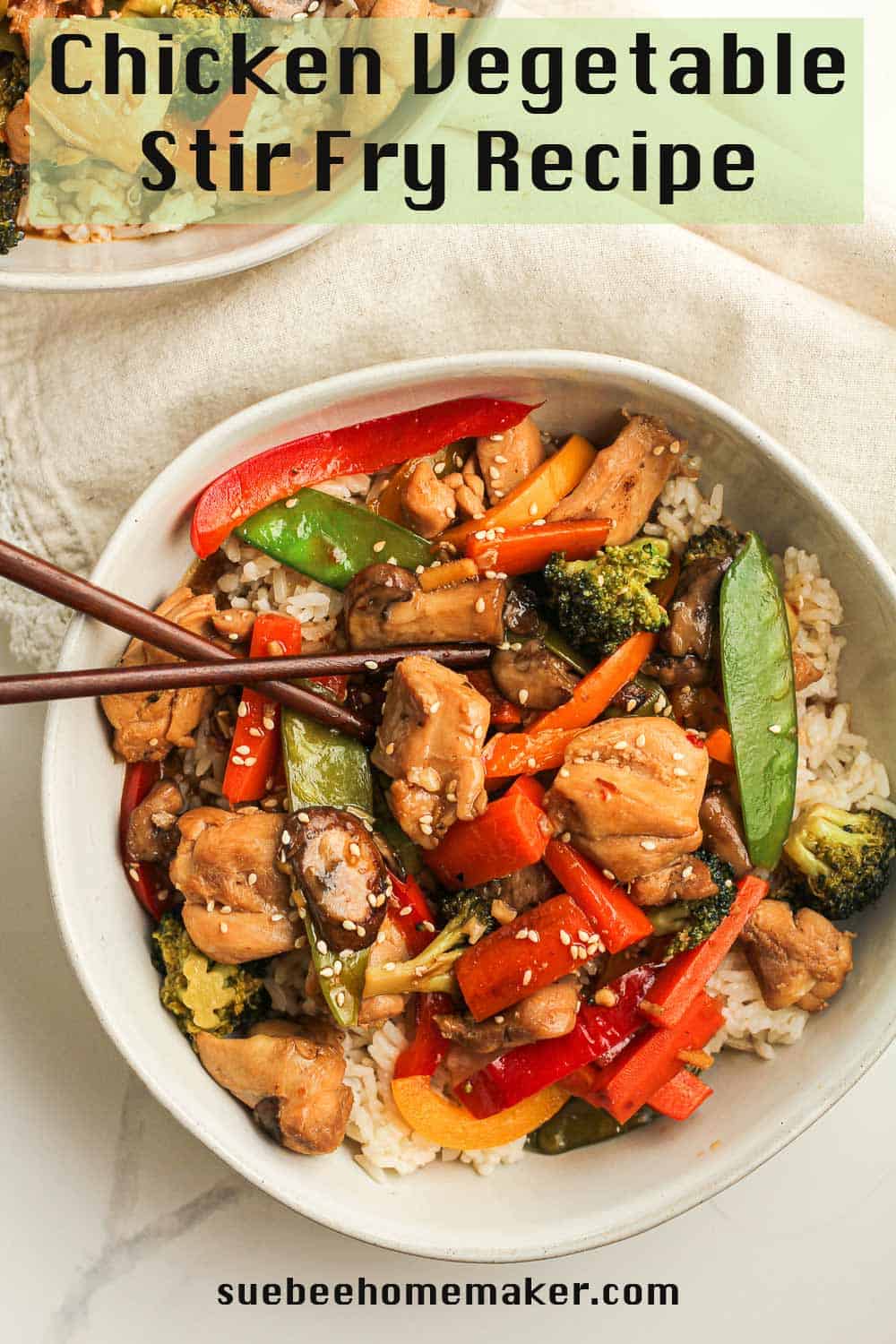 Overhead shot of a bowl of chicken veggie stir fry.