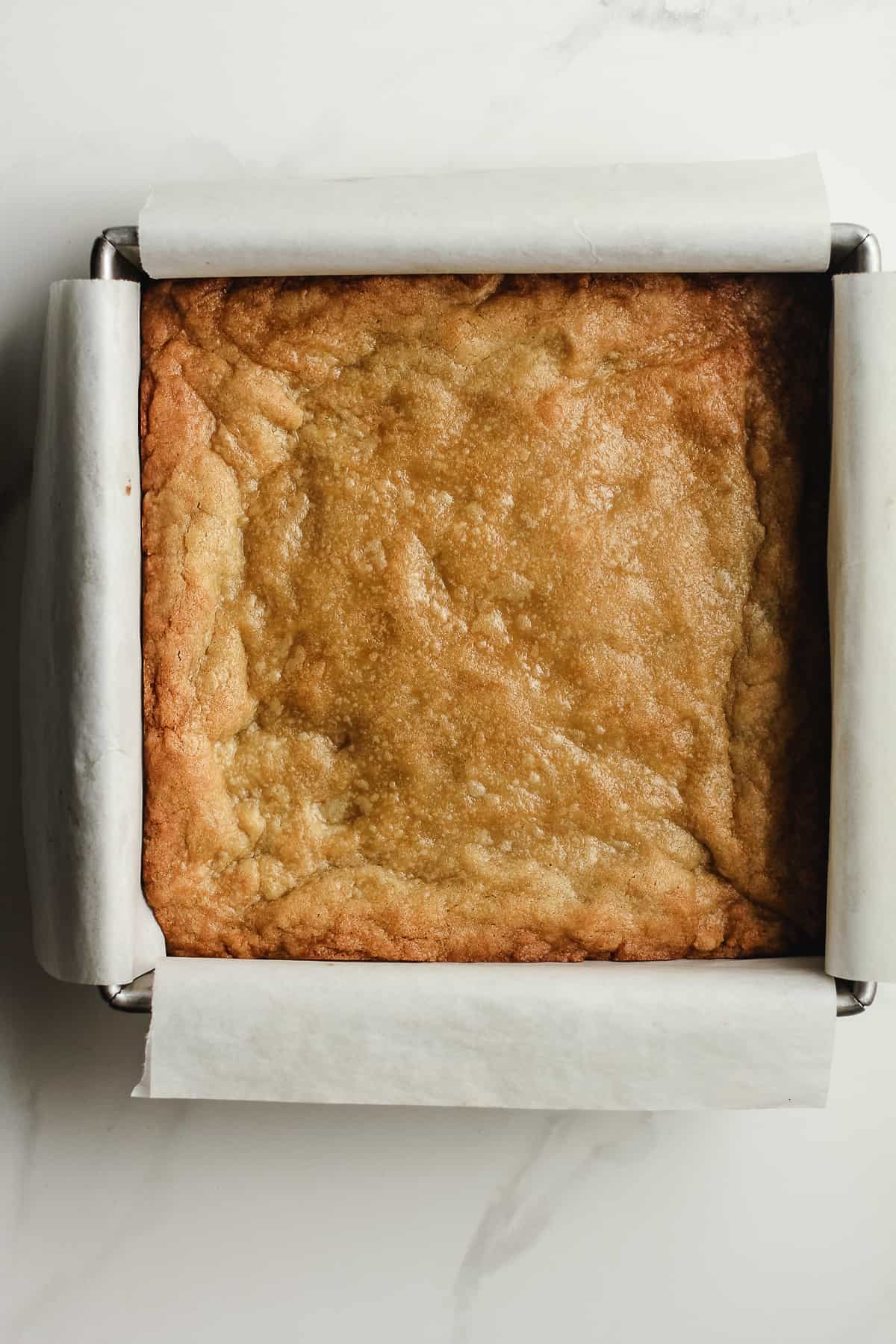 A pan of baked sugar cookie bars.