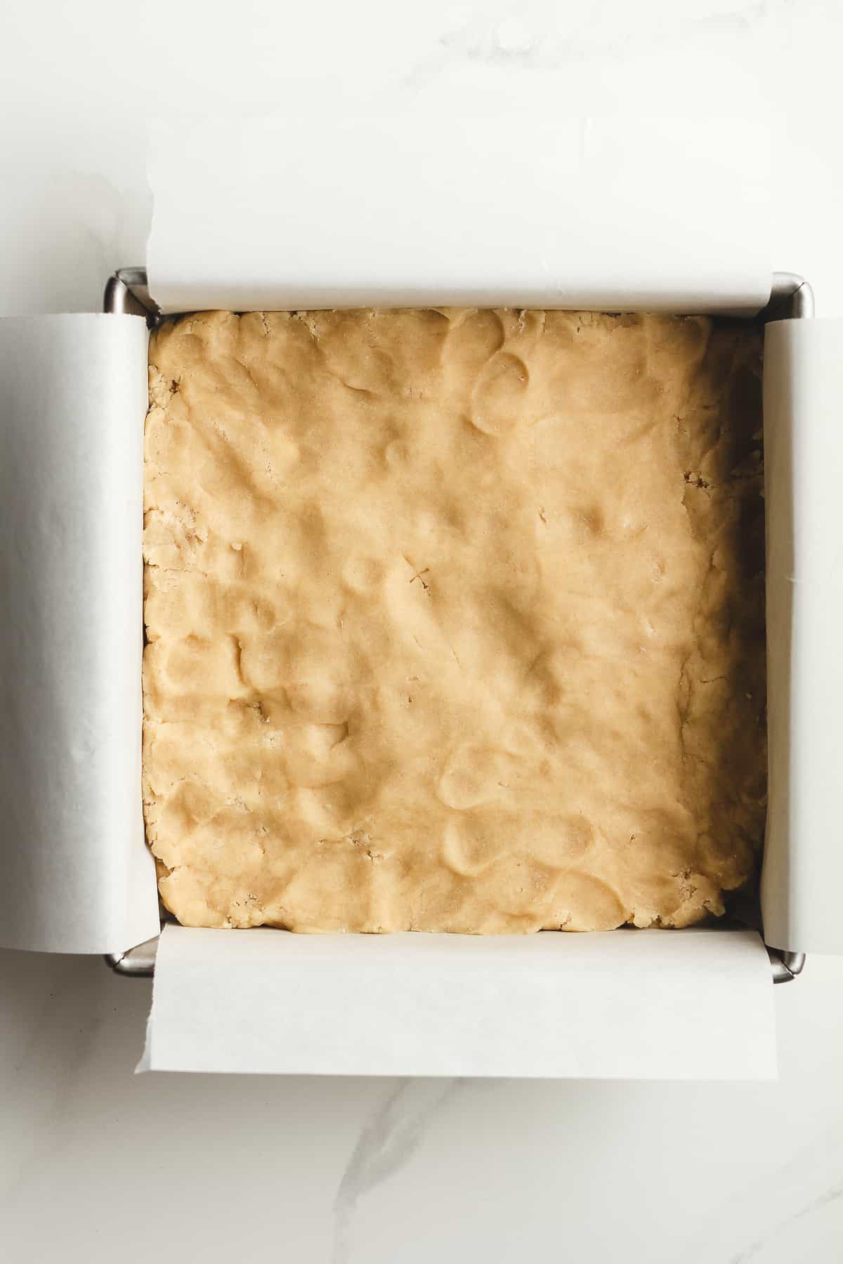 A pan of unbaked sugar cookie dough.