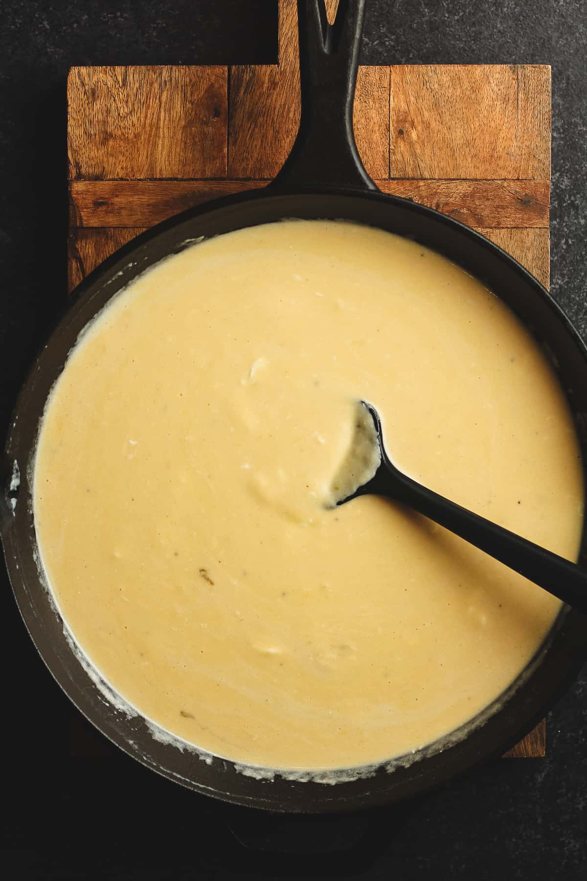 The cast iron skillet with the cooked roux.