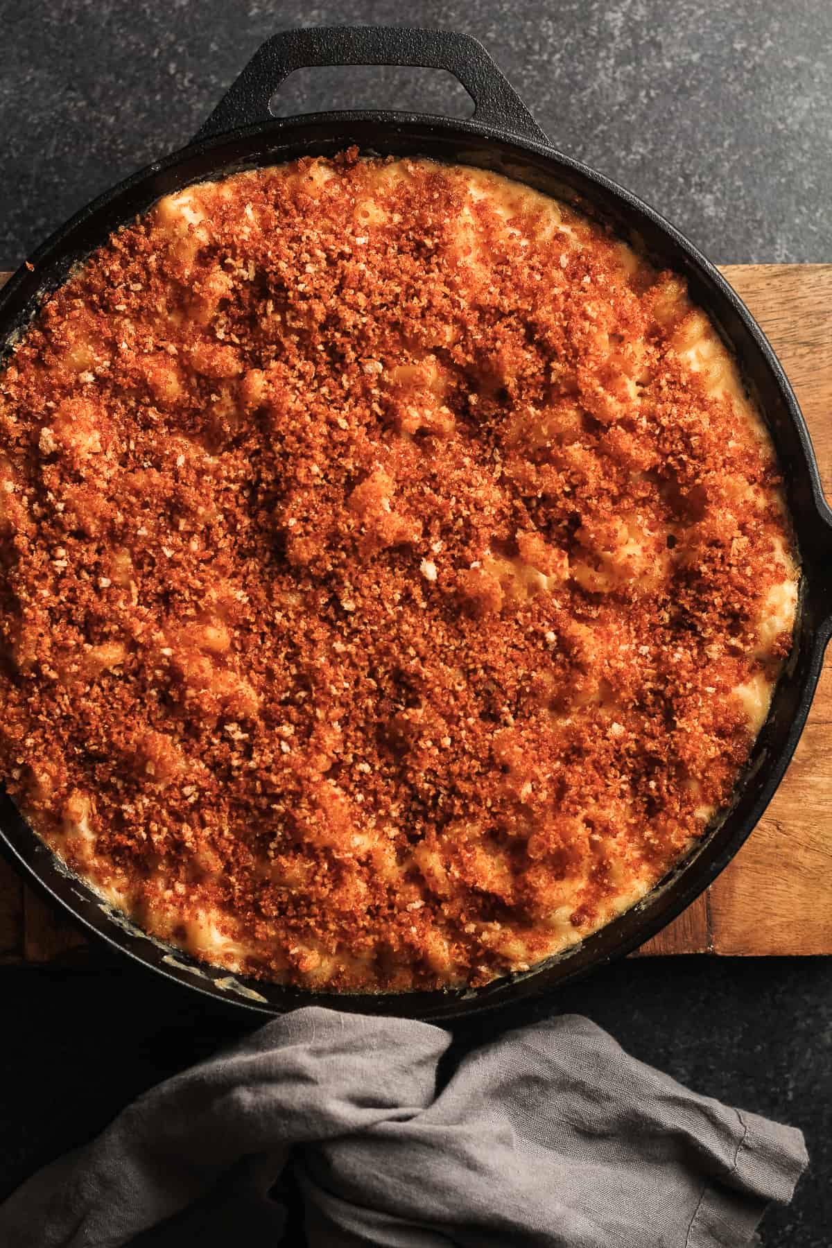 Overhead shot of a cast iron skillet of smoked pimento Mac and cheese.