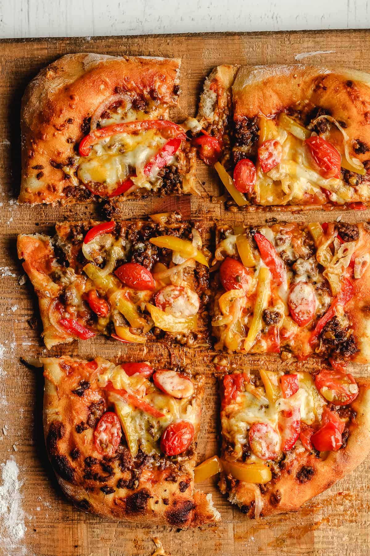 Overhead shot of 6 slices of pizza.