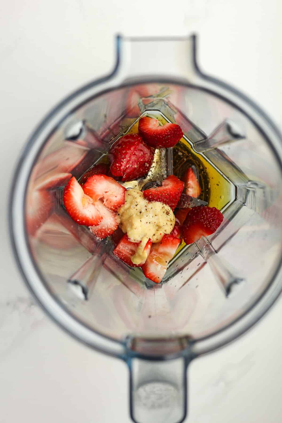 A mixer of the ingredients of the strawberry dressing.