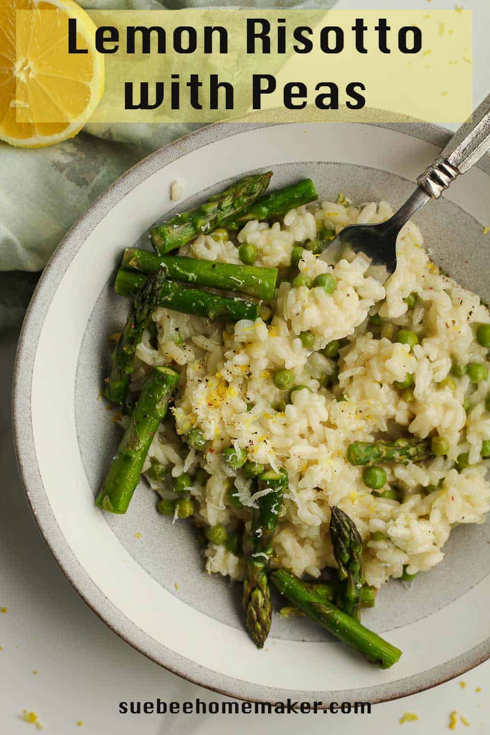 A bowl of lemon risotto with peas, with a fork.
