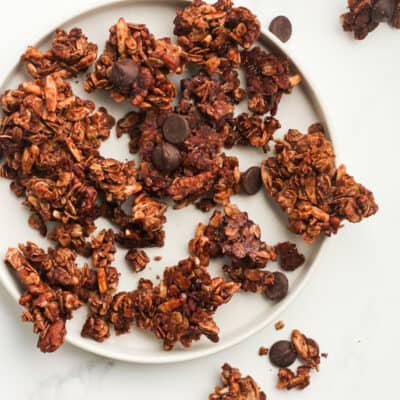A plate of chocolate granola clusters.