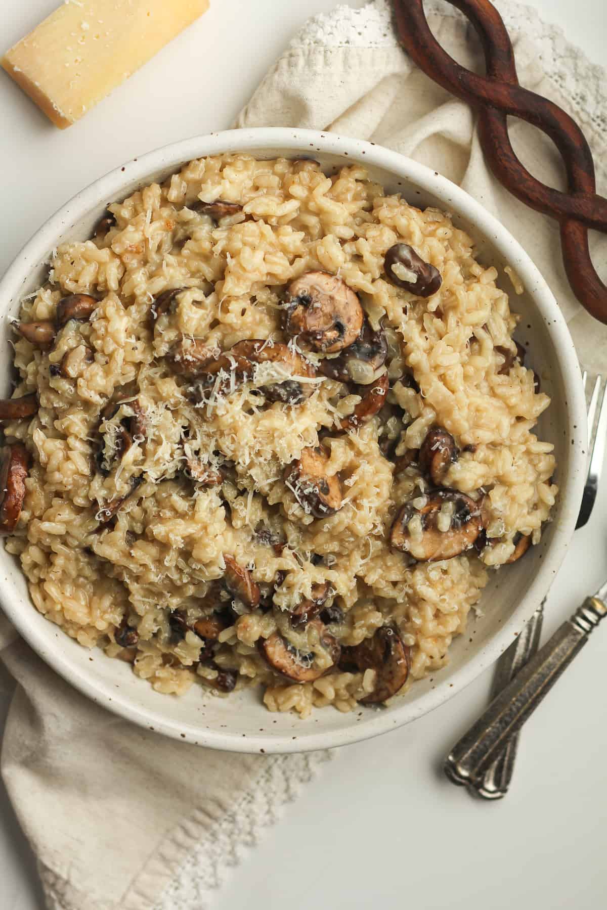 Creamy Mushroom Risotto on a tan napkin.