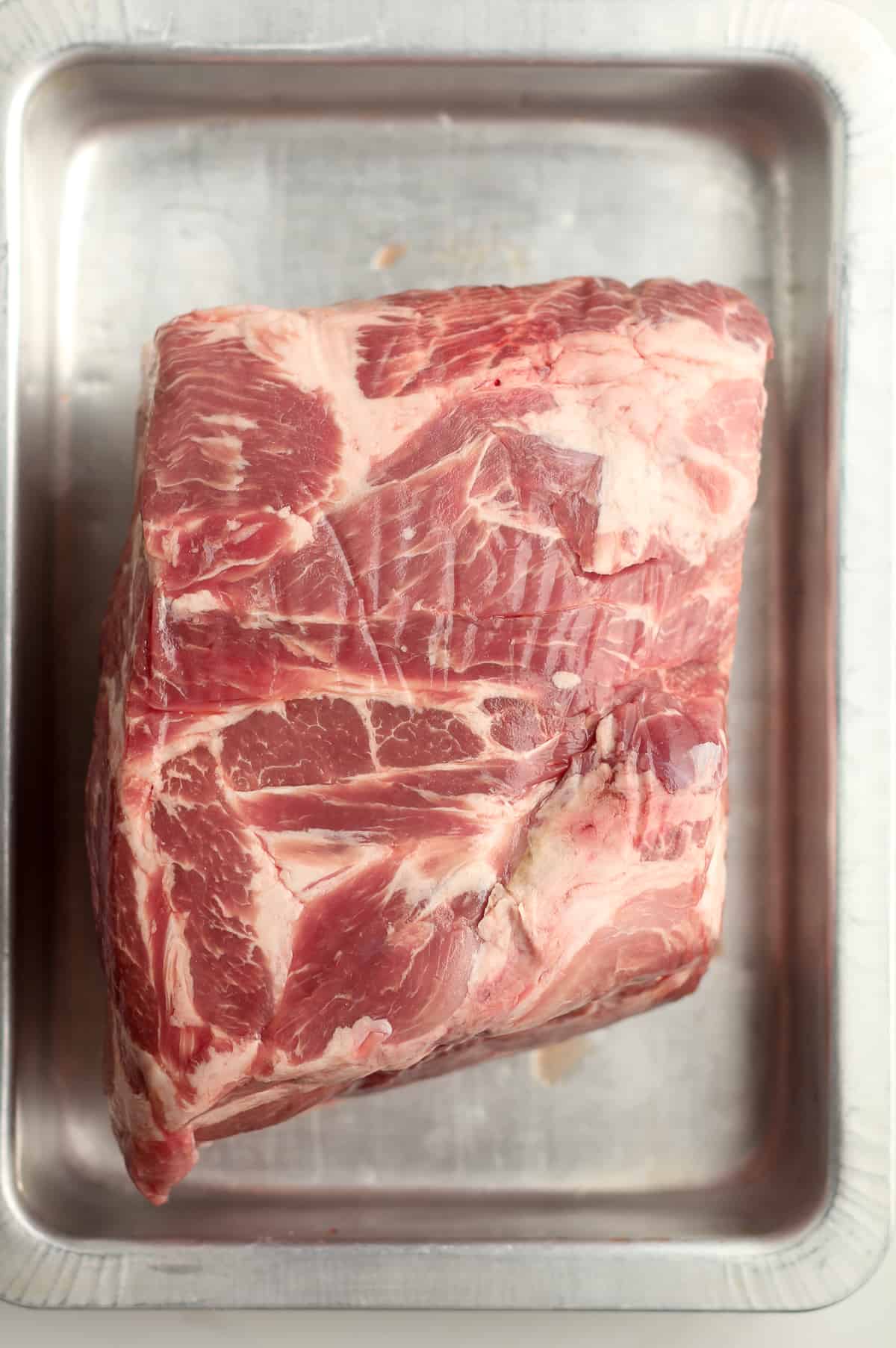 A raw pork shoulder.