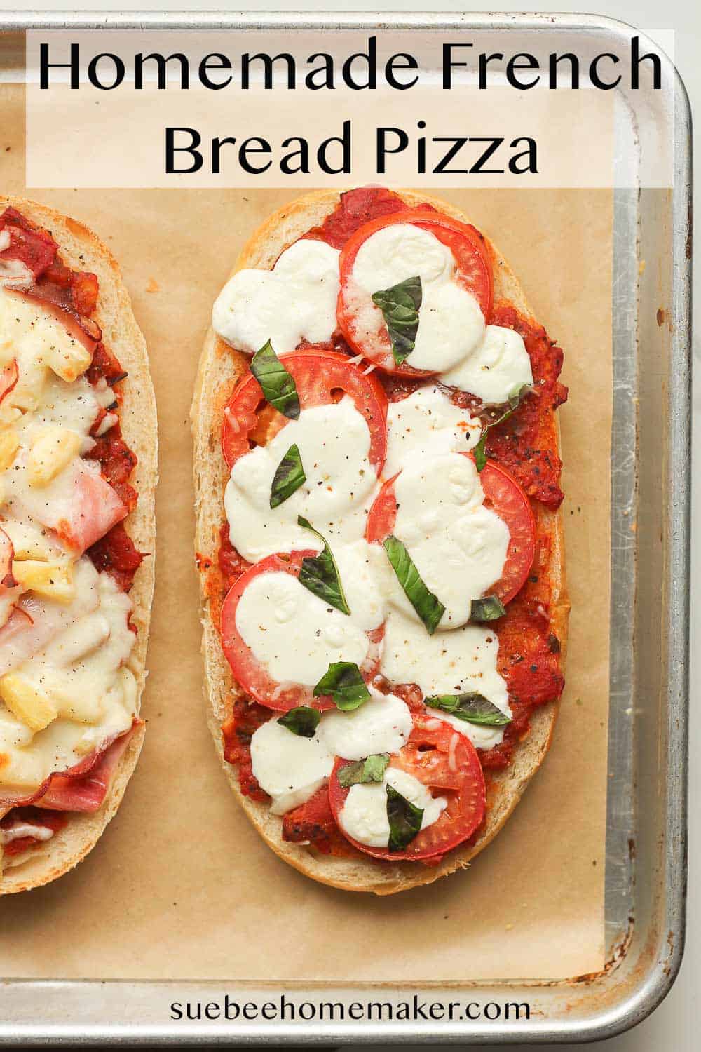A margherita French bread pizza on a baking sheet.