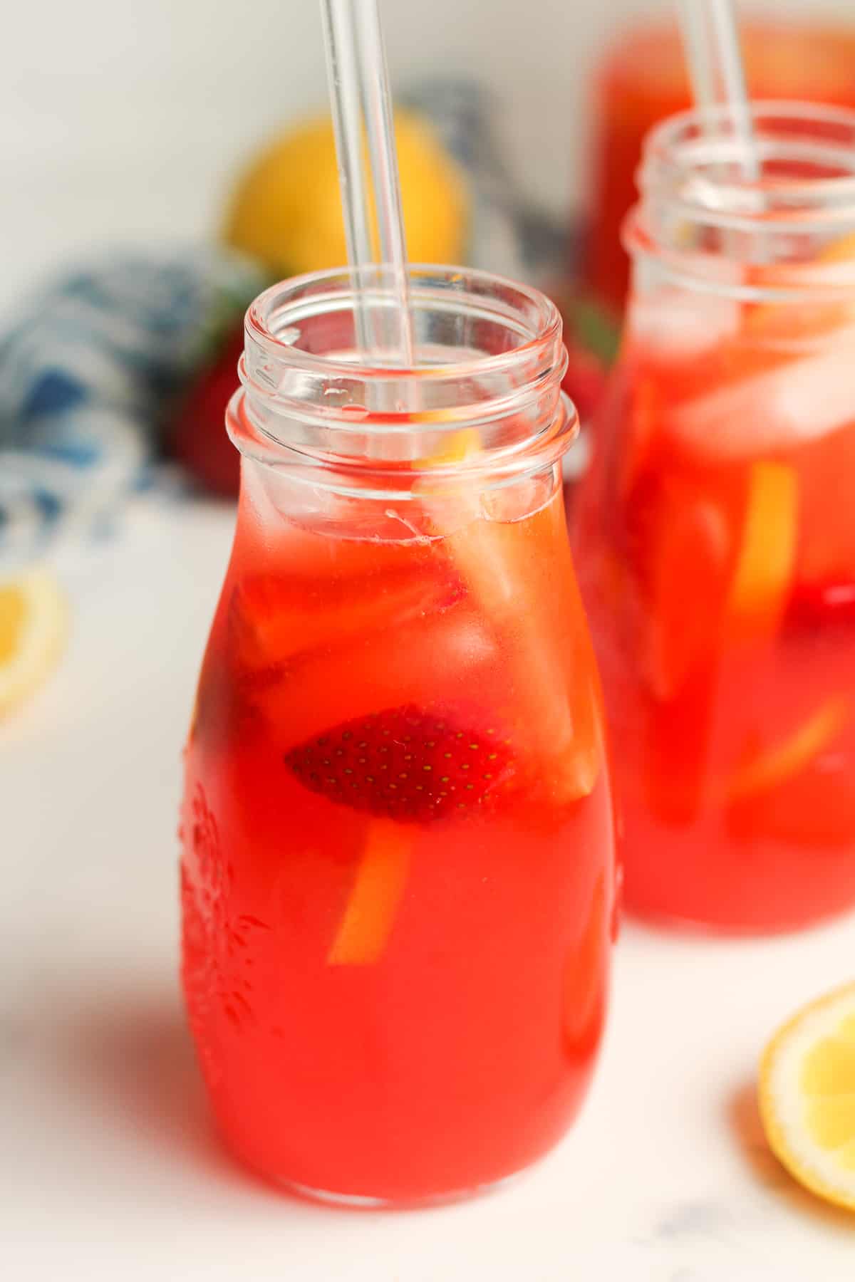 Two glasses of vodka strawberry lemonades.