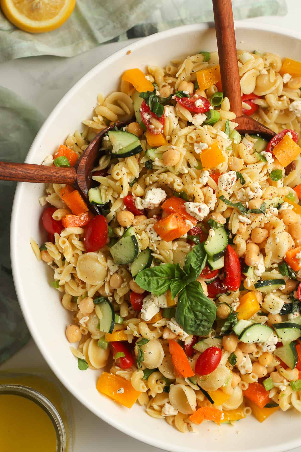 Closeup on a large bowl of summer pasta salad.