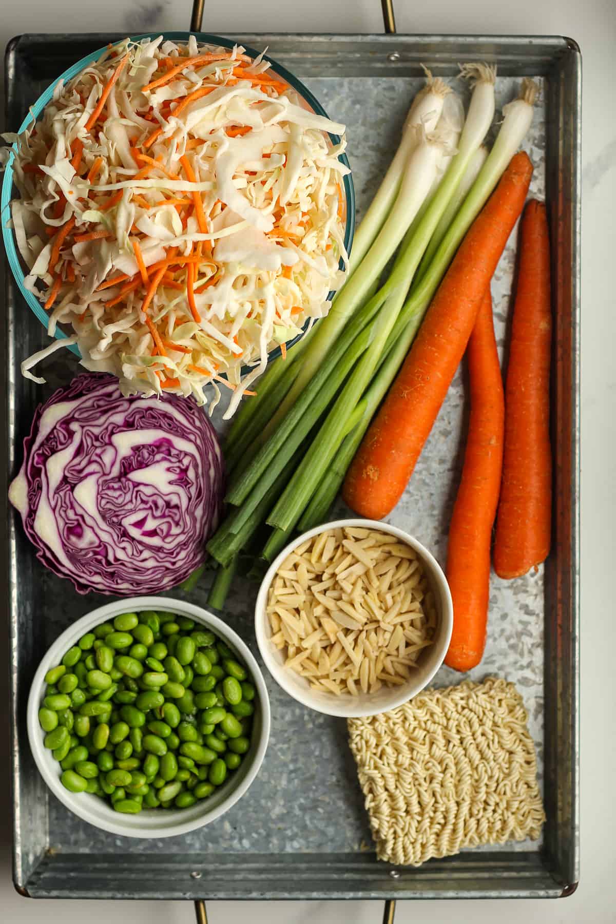 A tray of the cabbage salad ingredients.