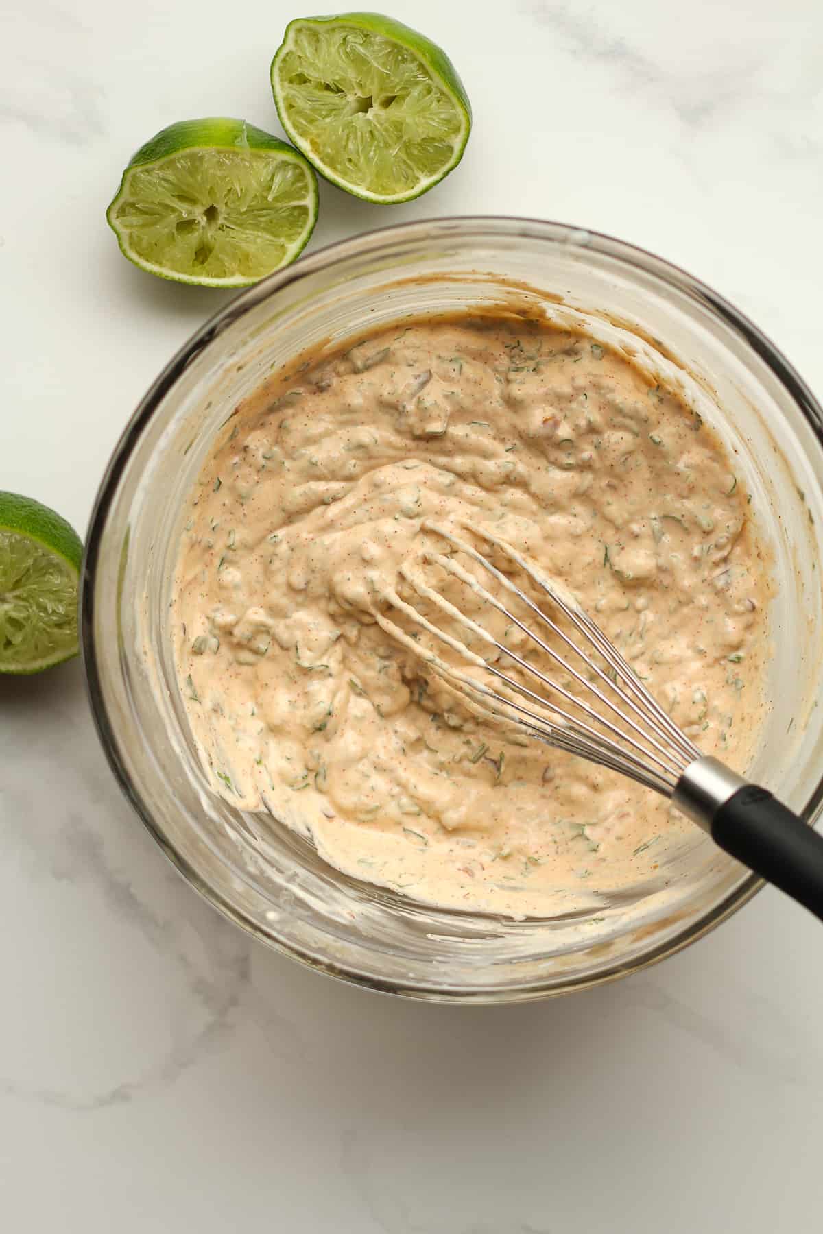 A bowl of the dressing after whisking.