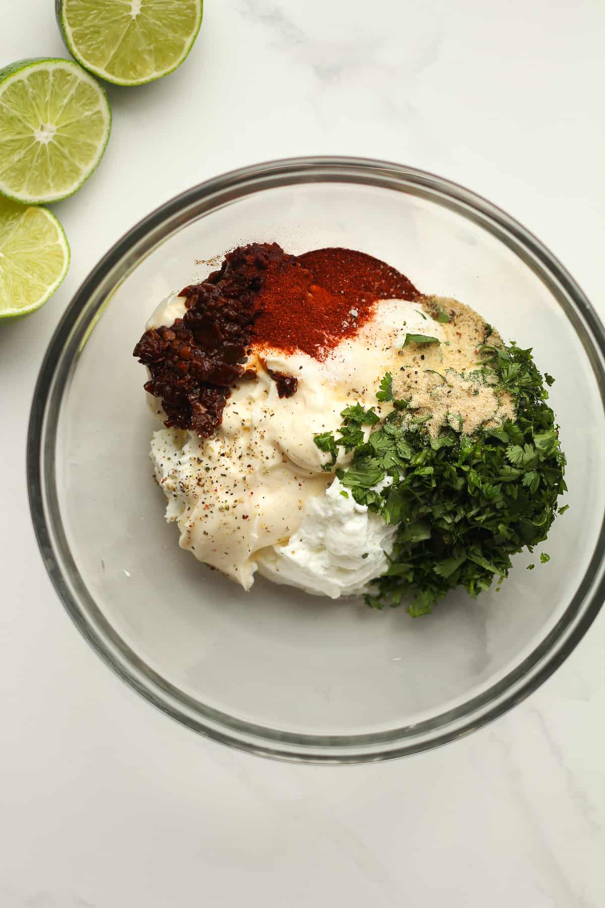 A bowl of the chipotle dressing ingredients.