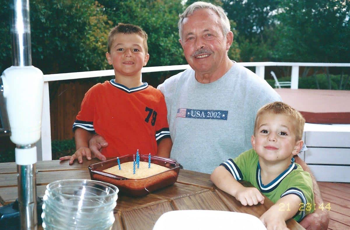 Dad with the boys outside.