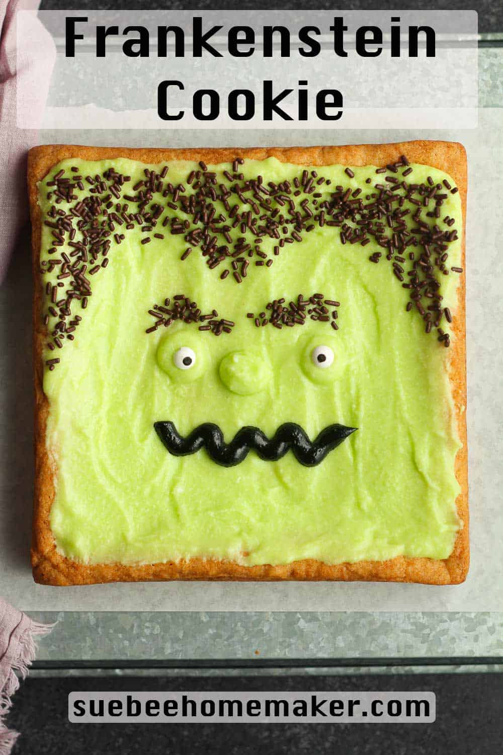 A Frankenstein cookie on a tray.