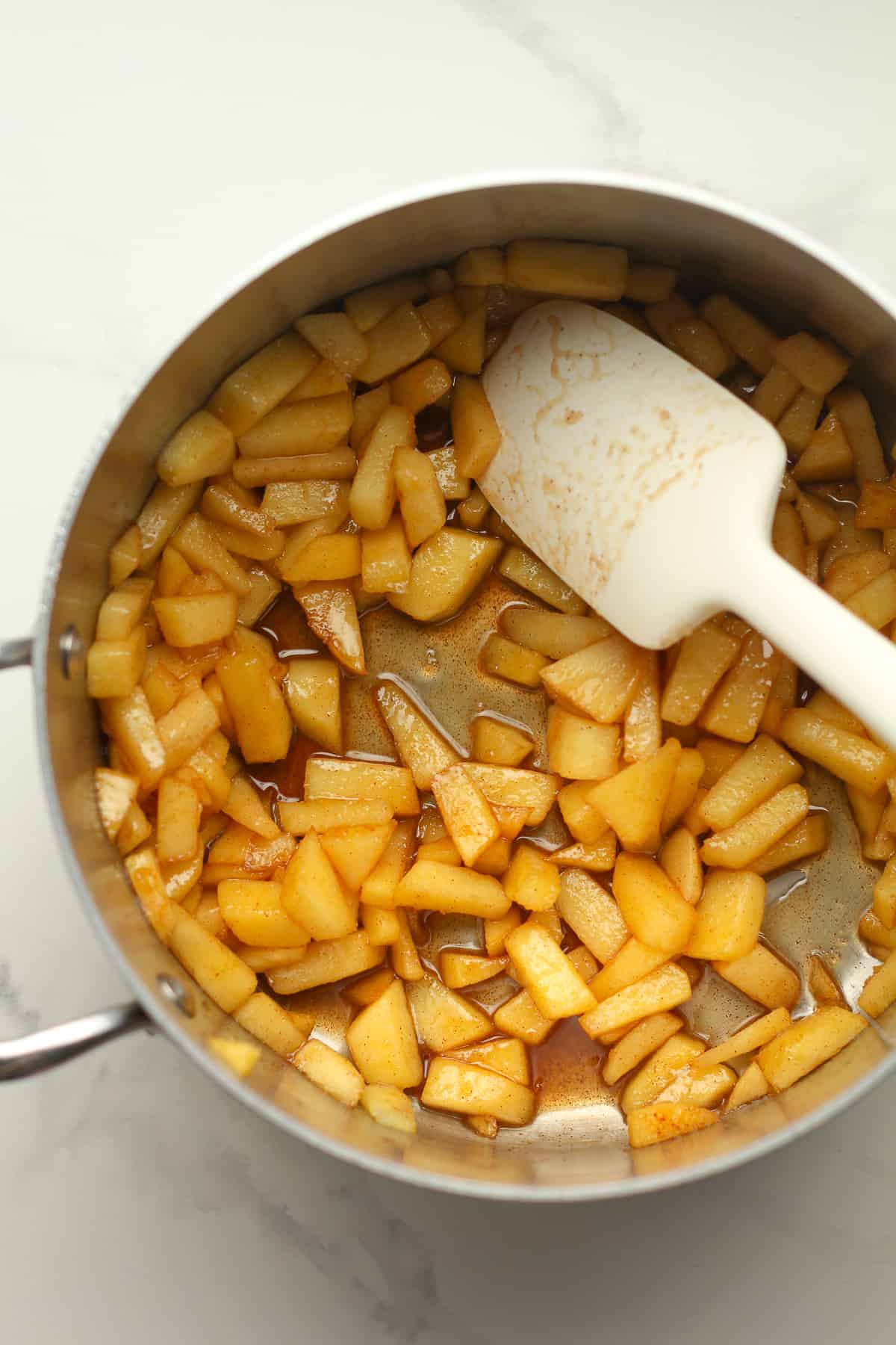 A pan of the cooked apple chunks.