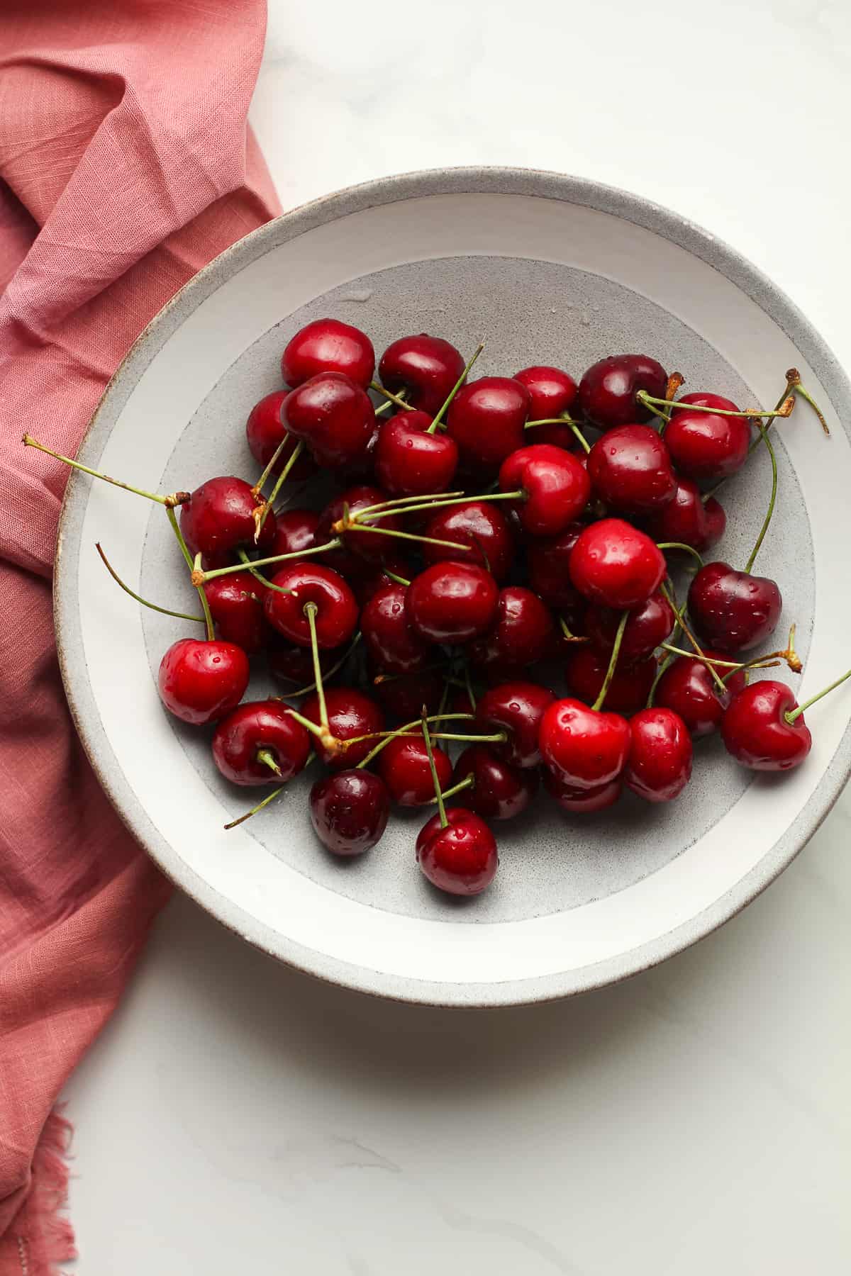 A bowl of red cherries.