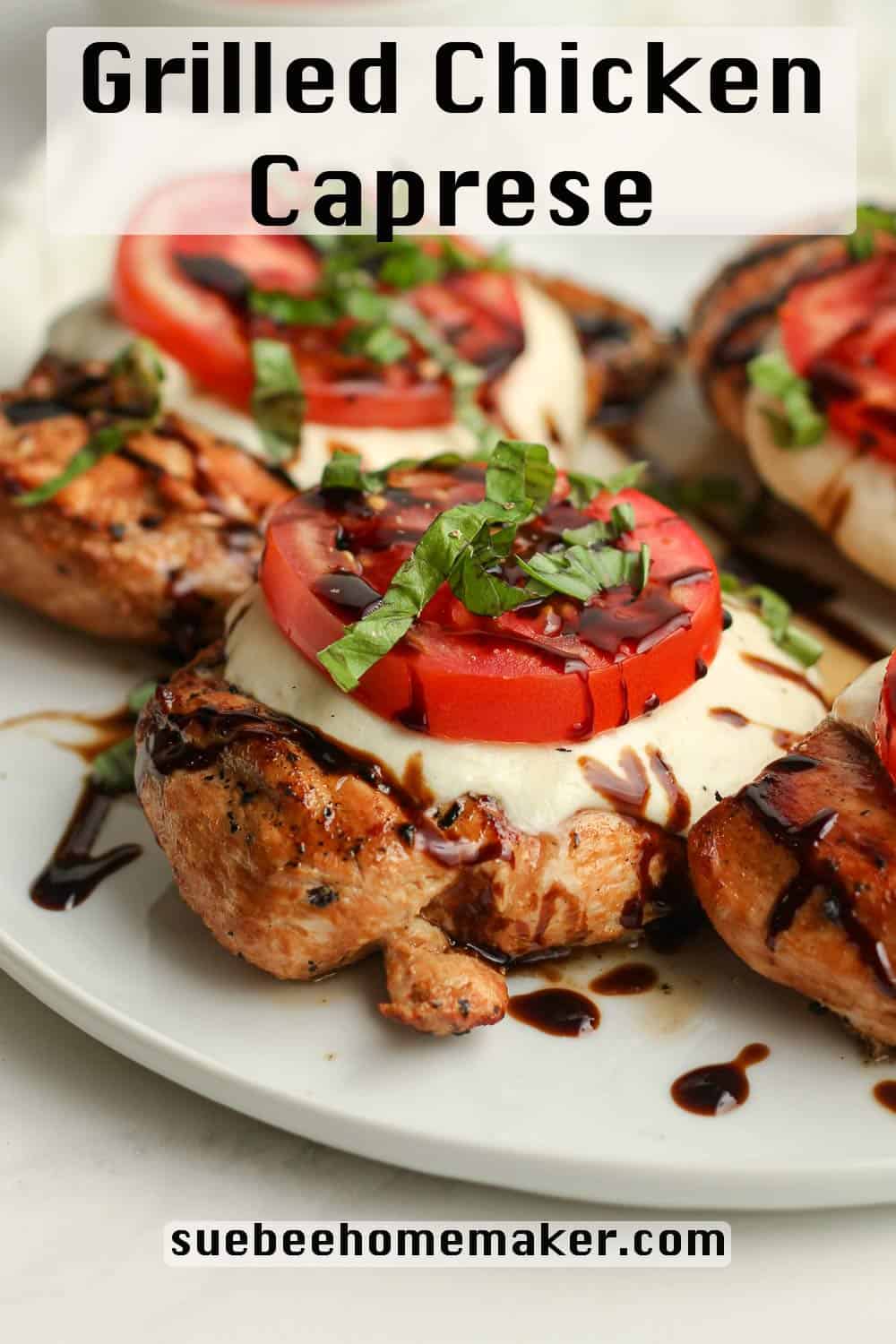 Side shot of a plate of grilled chicken Caprese.