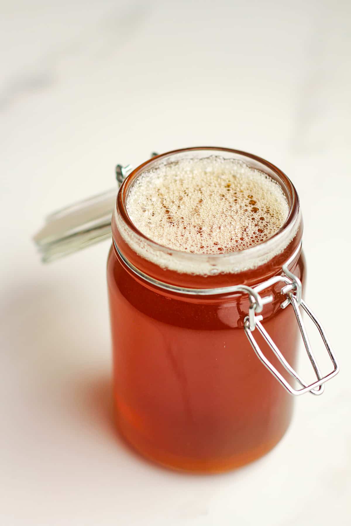 A jar of honey simple syrup.