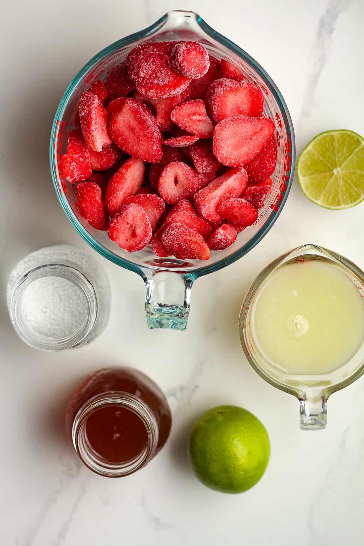 The ingredients for strawberry daiquiri mocktails.