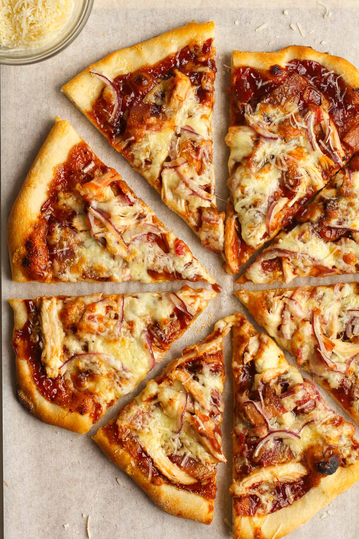 Overhead shot of a sliced bbq chicken pizza.