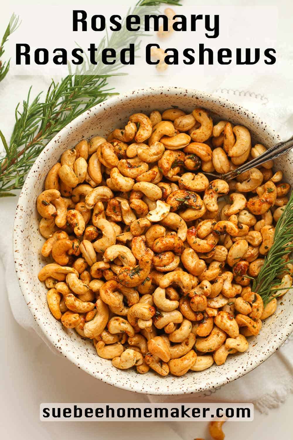 A bowl of roasted rosemary cashews.